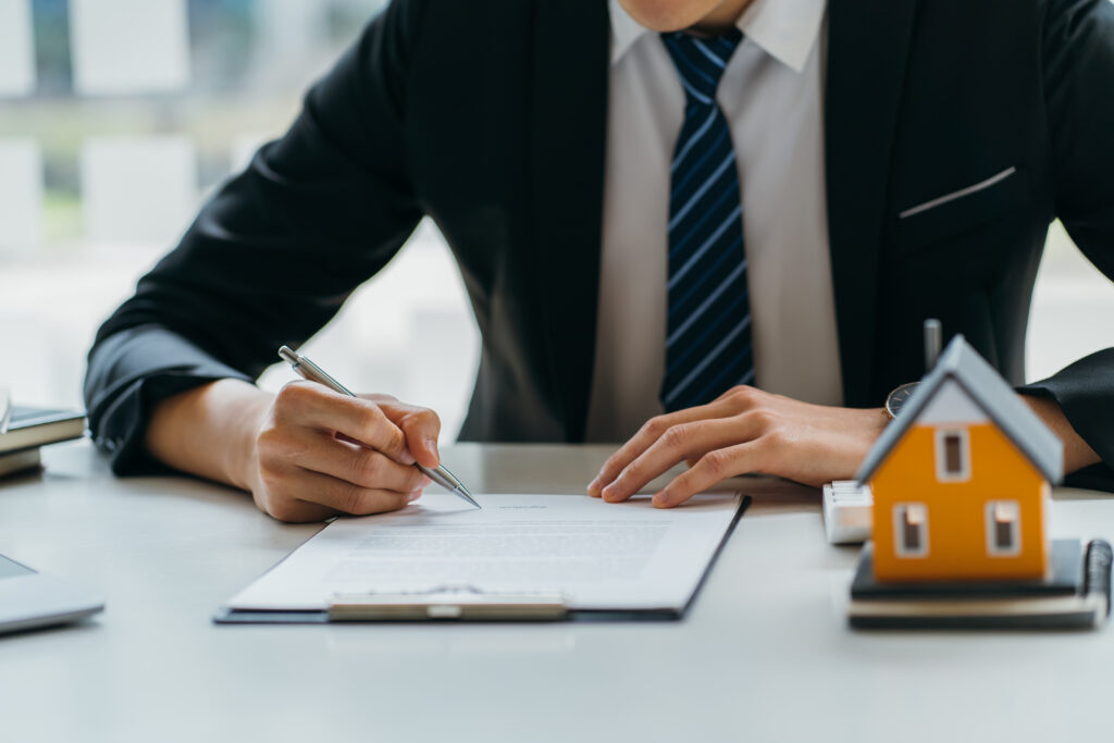 Real Estate Agent Broker Or House Developer Showing Contract For